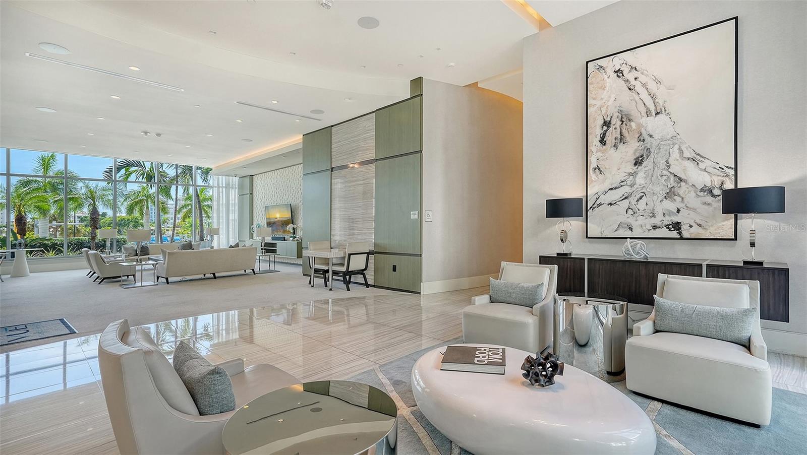 Multiple elegant lobby seating areas provide inviting spaces to welcome guests, socialize, and gather in sophisticated comfort.