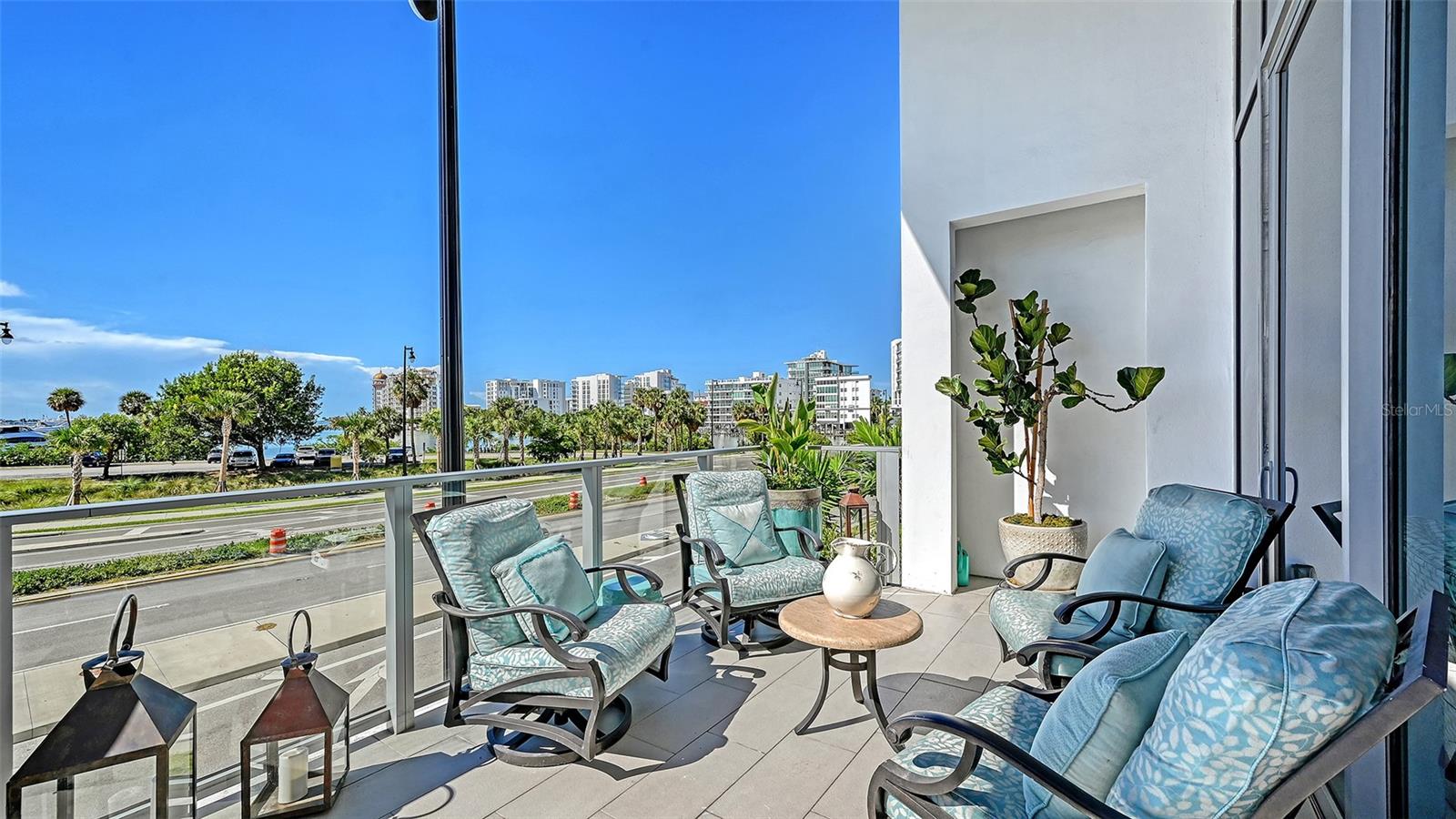 Enjoy captivating views of the marina and Sarasota Bay from this exceptional waterfront residence.