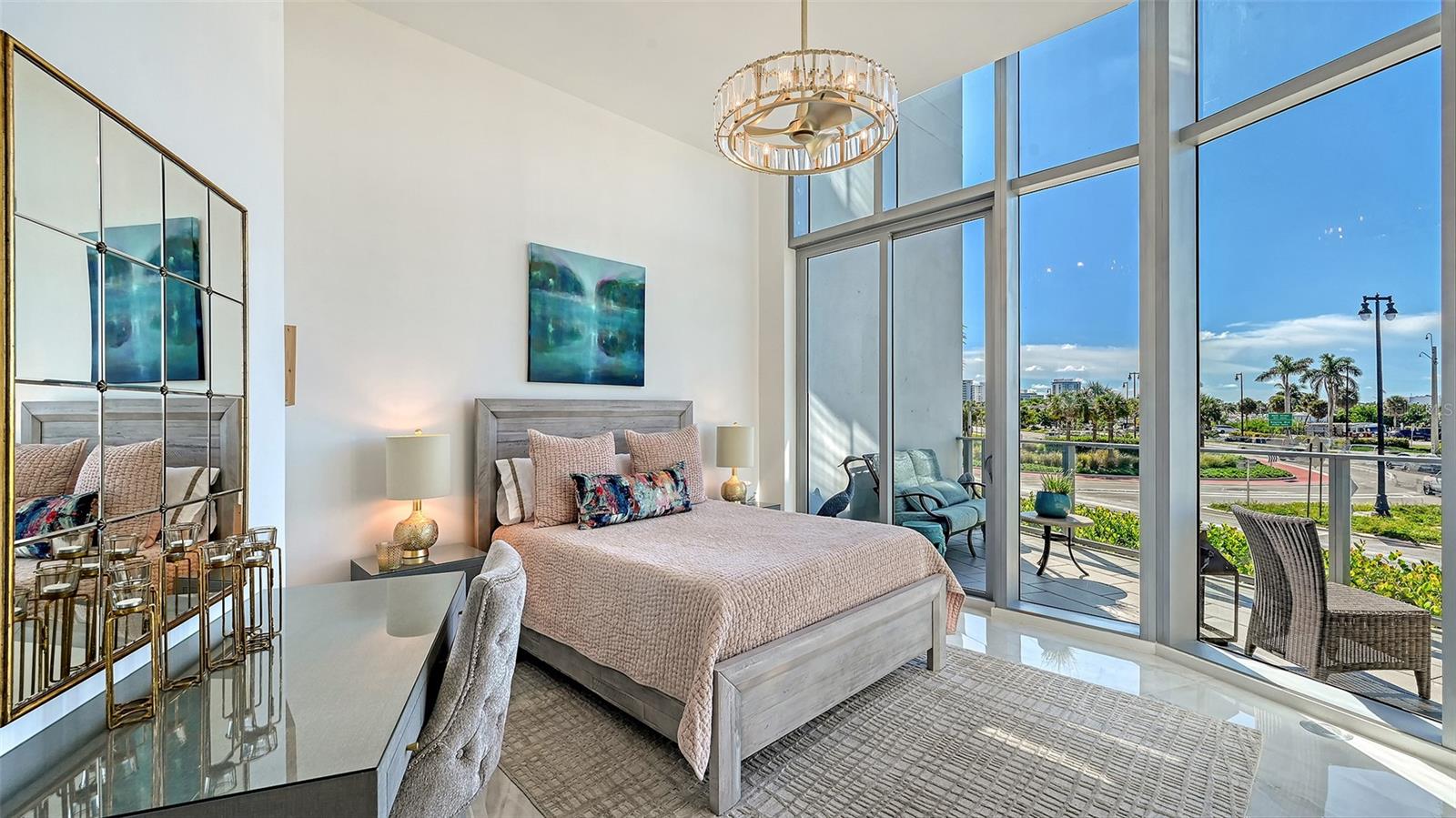 A bright, serene primary suite filled with natural light, offering an elegant retreat with sophisticated finishes and a calming, airy ambiance.