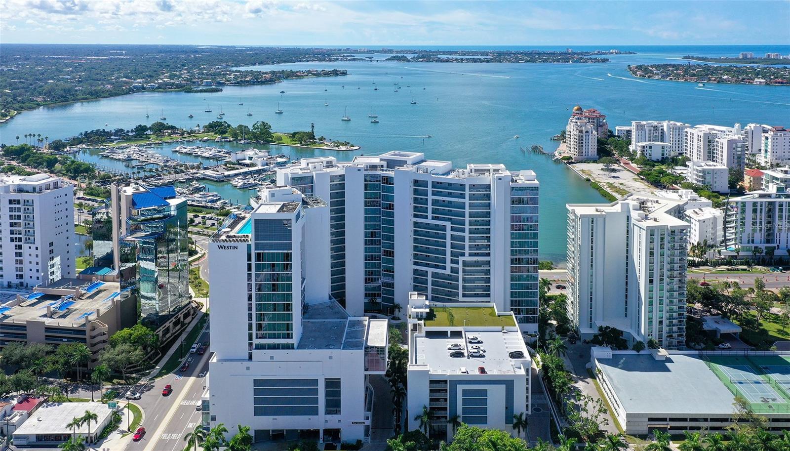 Aerial views showcase The VUEs premier downtown Sarasota location, ideally positioned along the waterfront with spectacular views of Sarasota Bay.