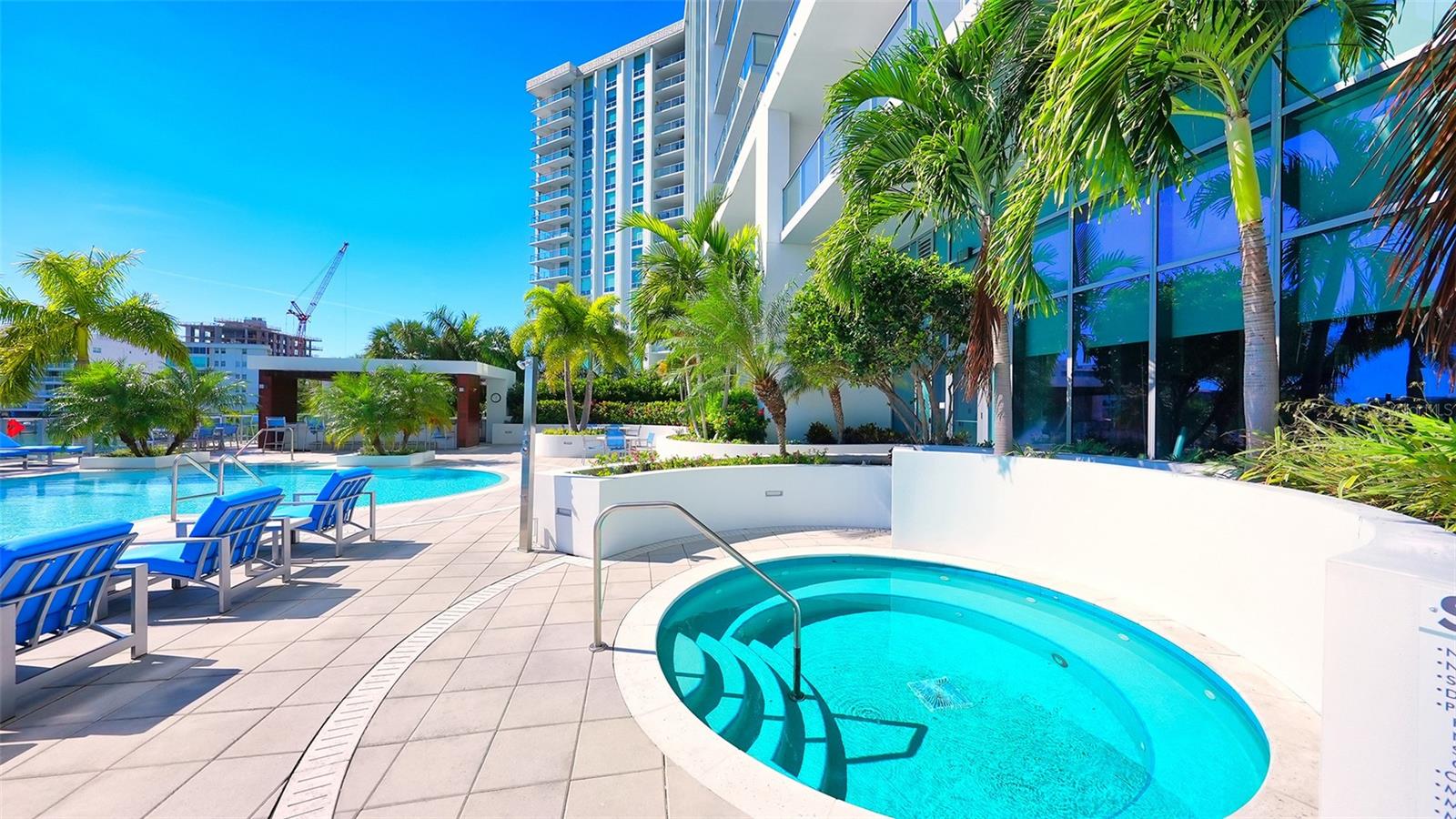 Unwind in the poolside spa, the perfect retreat for relaxation and rejuvenation.