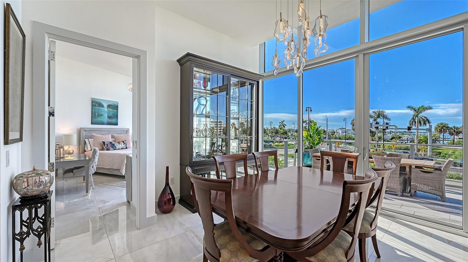 Bathed in natural light, this refined space offers the perfect setting for memorable dining and upscale entertaining.