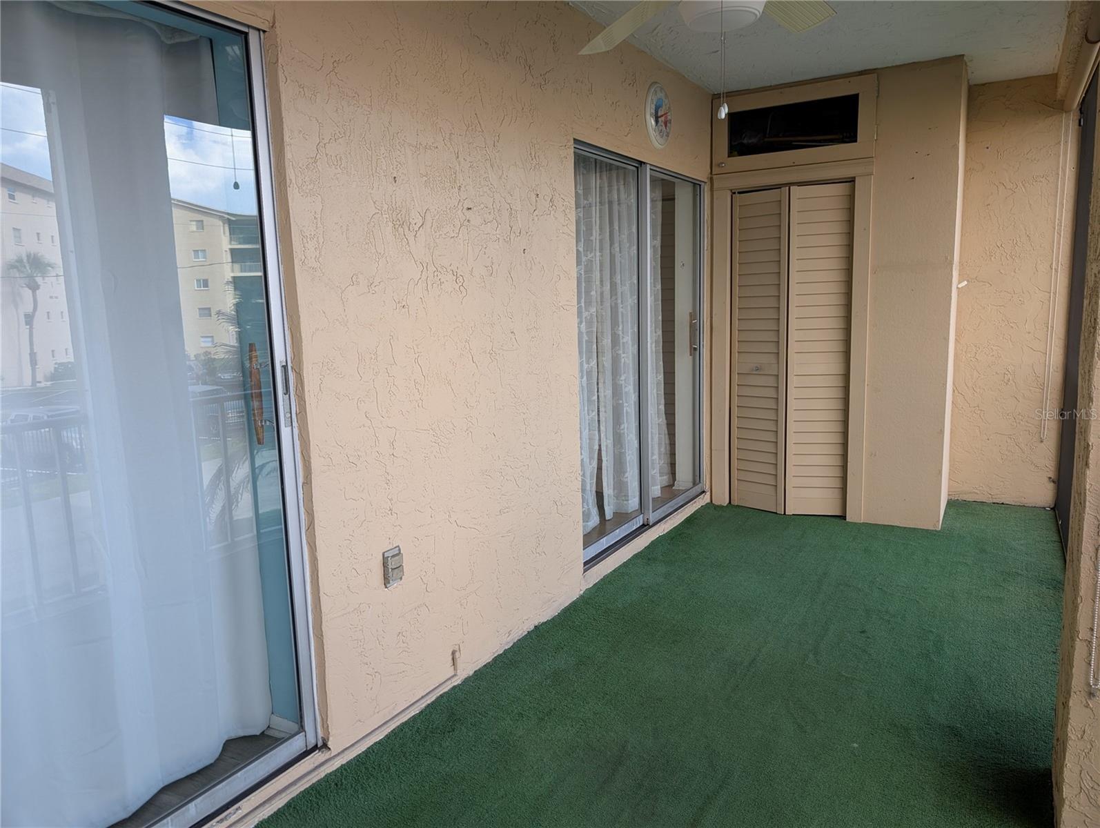 Sliding glass doors from both living & master bedrooms.