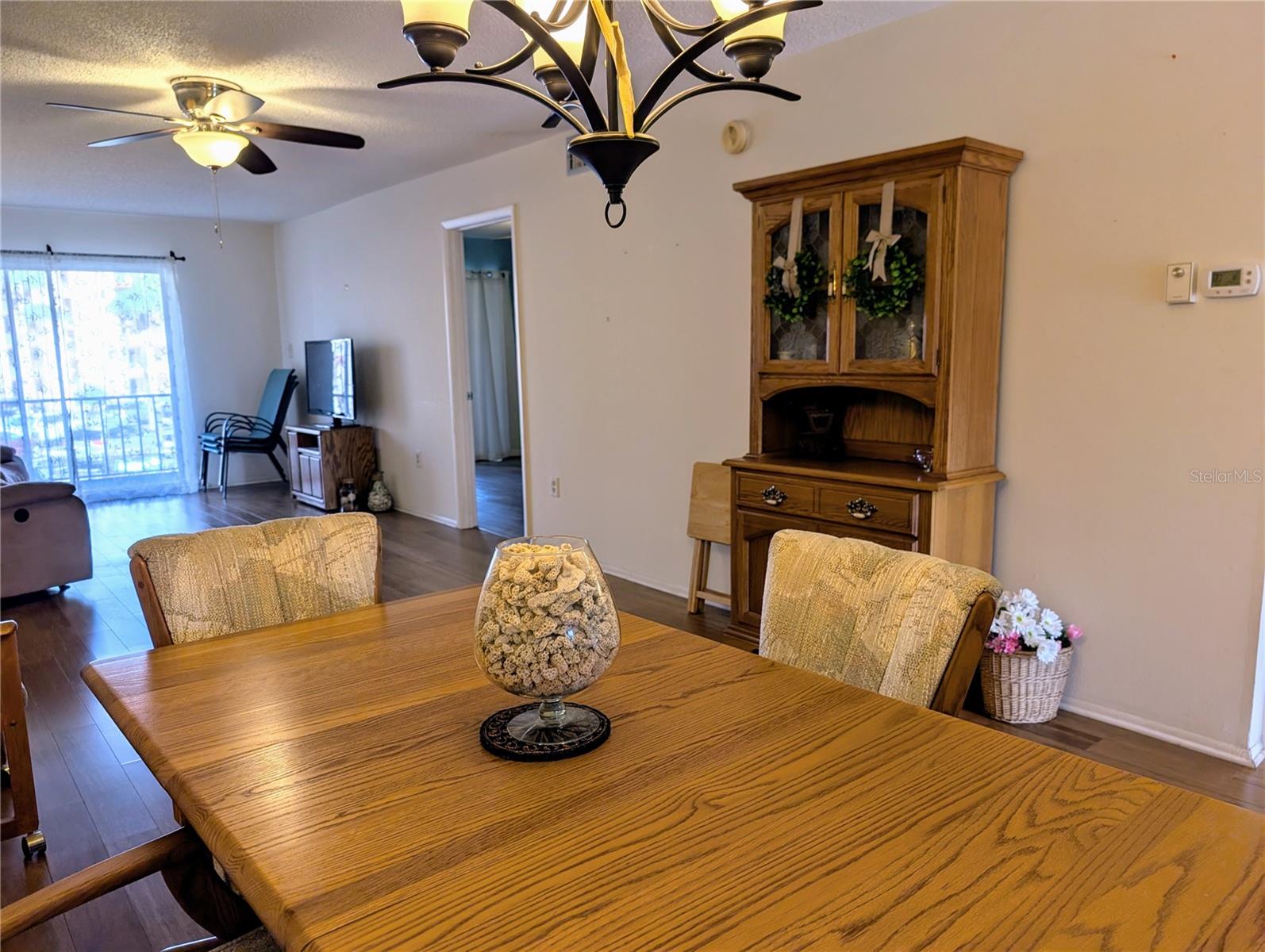 Upgraded lighting features & fine ceiling fans in main and bedrooms.