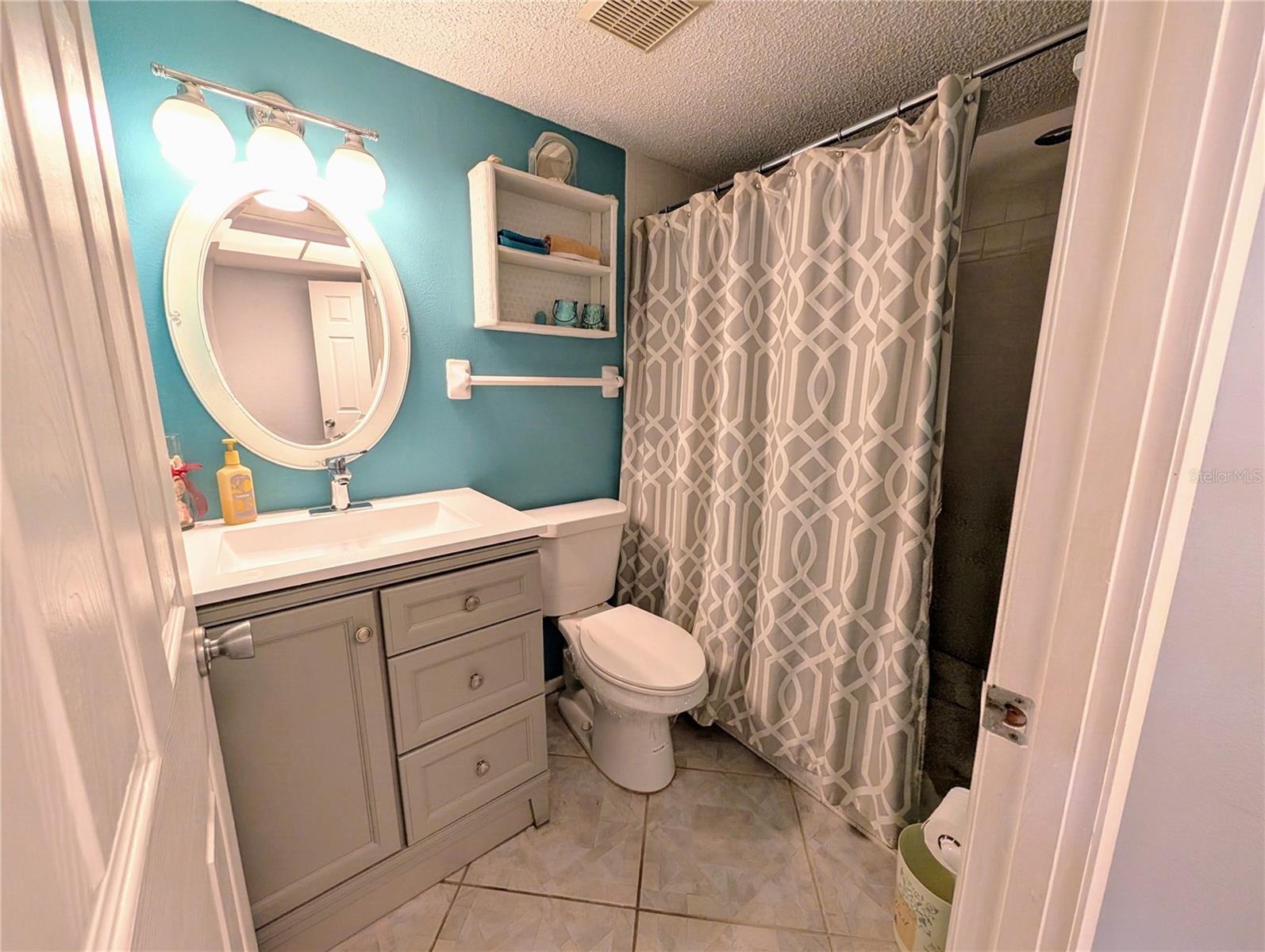 Master bath...note diagonal tile flooring & upgraded features
