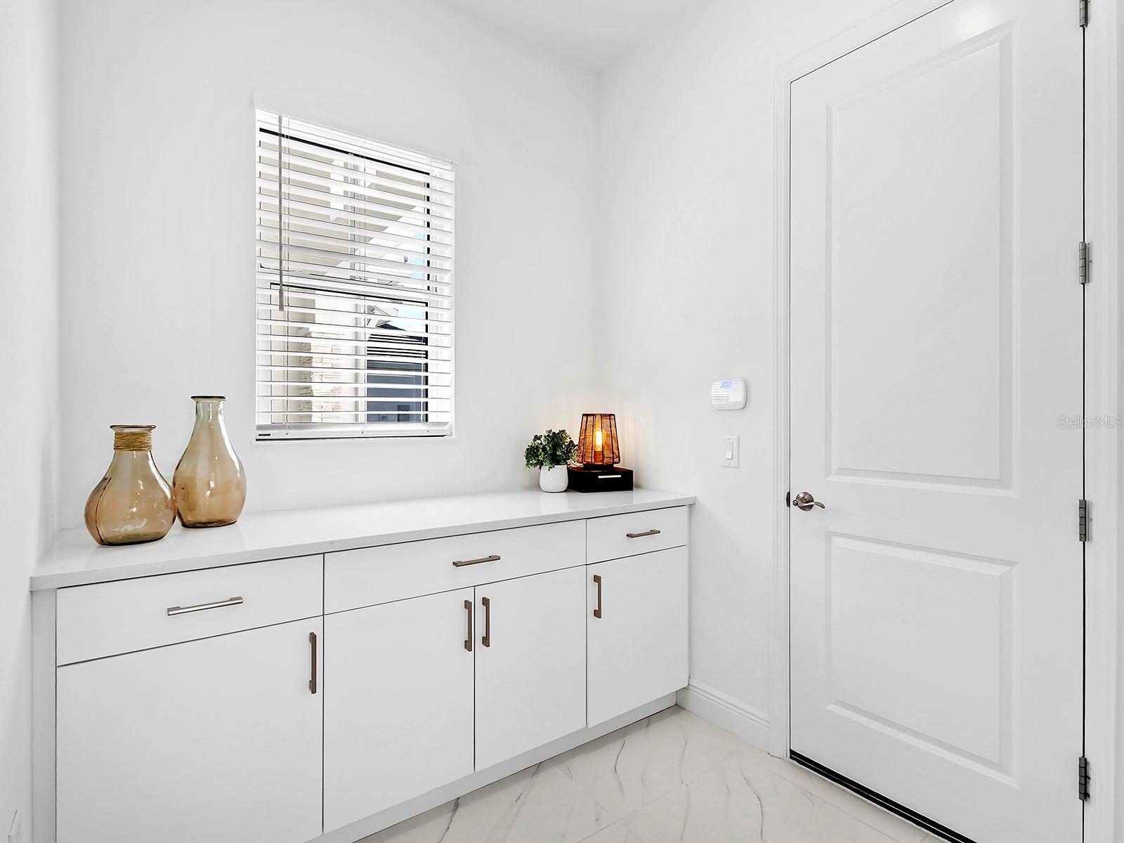 Mudroom entry with custom built-ins