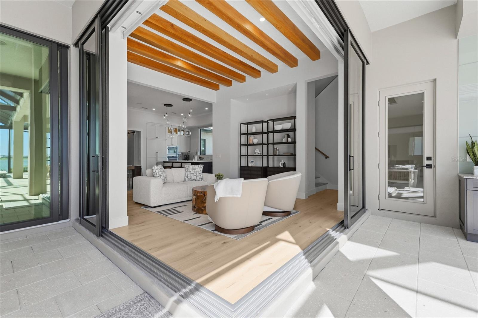 Seamless indoor/outdoor living with frameless corner pocket sliders