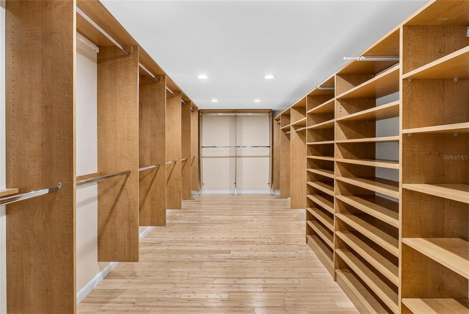 One of two walk in closets in the second floor primary suite offers exceptional storage space.