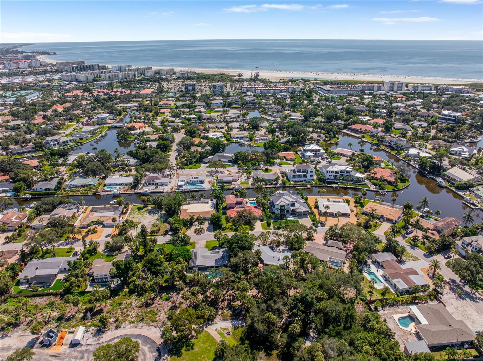 Aerial perspective showing how close the home is to Siesta Key Beach and the Gulf.