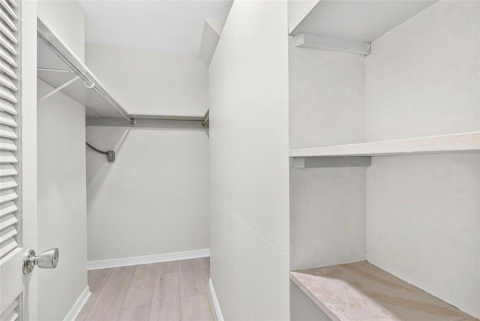 The first floor primary suite includes two walk in closets, providing generous storage.