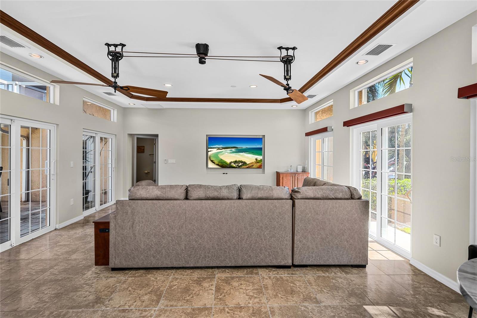 The approximately 424 square foot flex room offers generous space for media, games, fitness, lounging or other flexible uses.