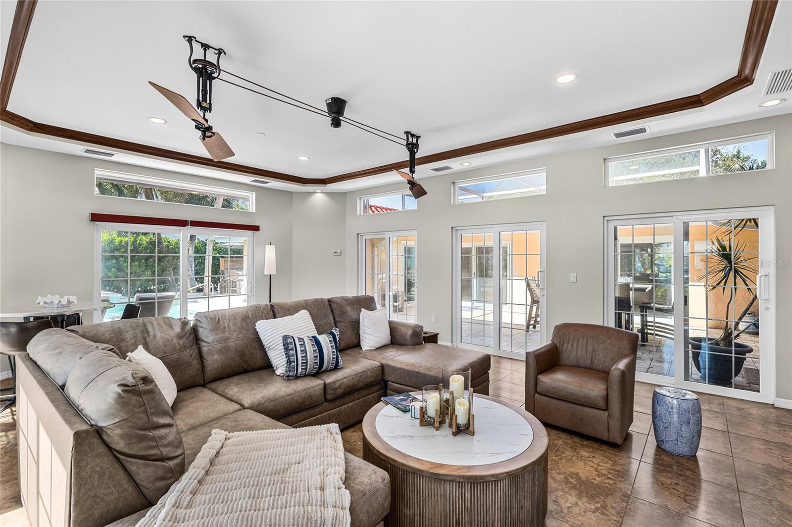 The approximately 424 square foot flex room offers generous space for media, games, fitness, lounging or other flexible uses.