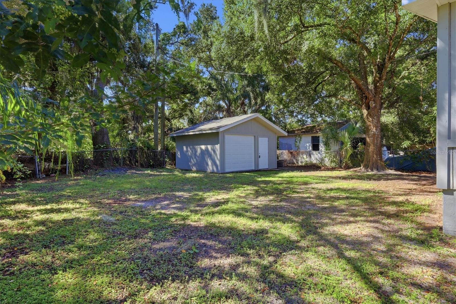 Backyard and detached garage.