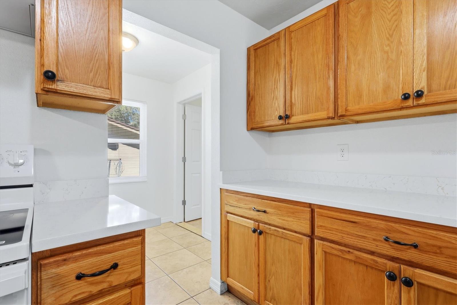 Kitchen access to the breakfast area.