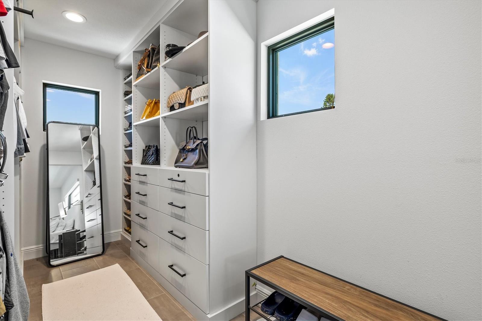 Primary walk-in closet.