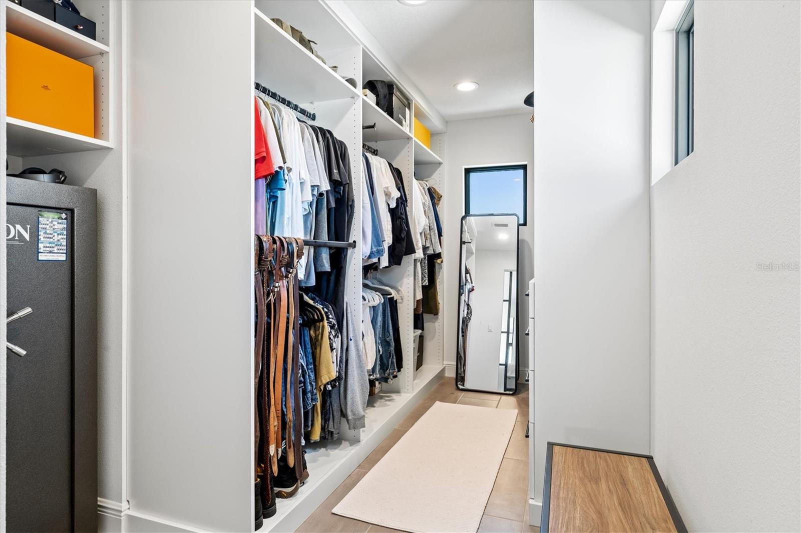 Primary walk-in closet.