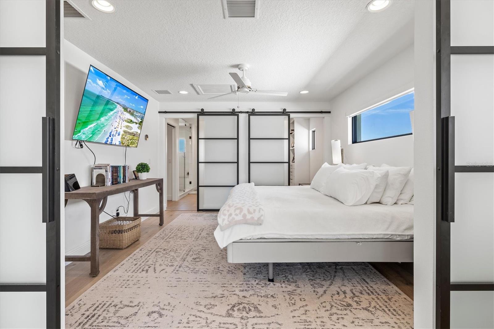 Primary suite sitting room with views of the river.