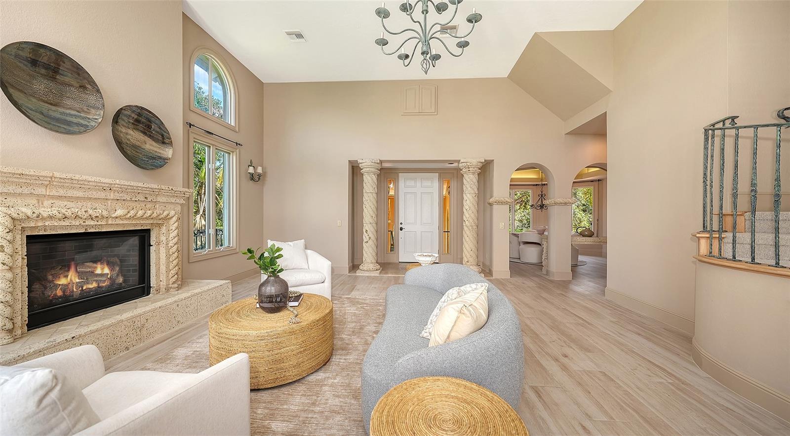 A fireplace, custom millwork and graceful architectural elements bring warmth and character to the main living area.