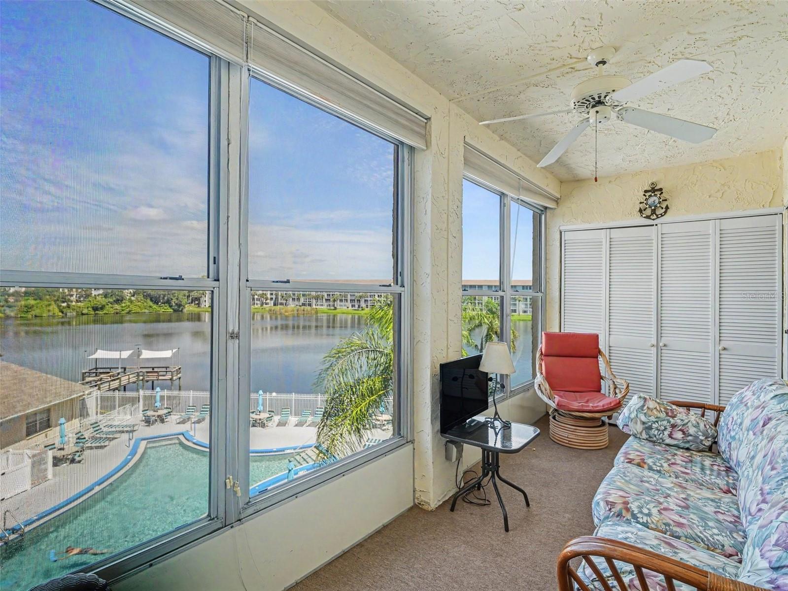 Enclosed Lanai overlooking the lake and pool