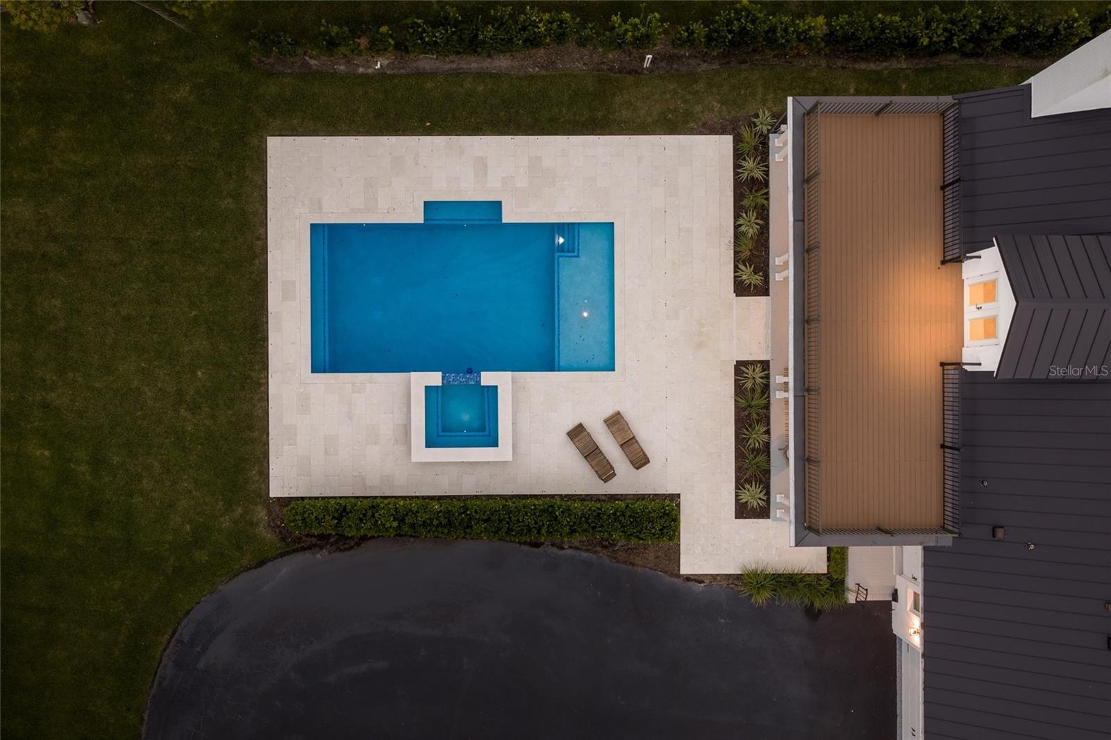 Aeriel view of pool and spa and upstairs deck.