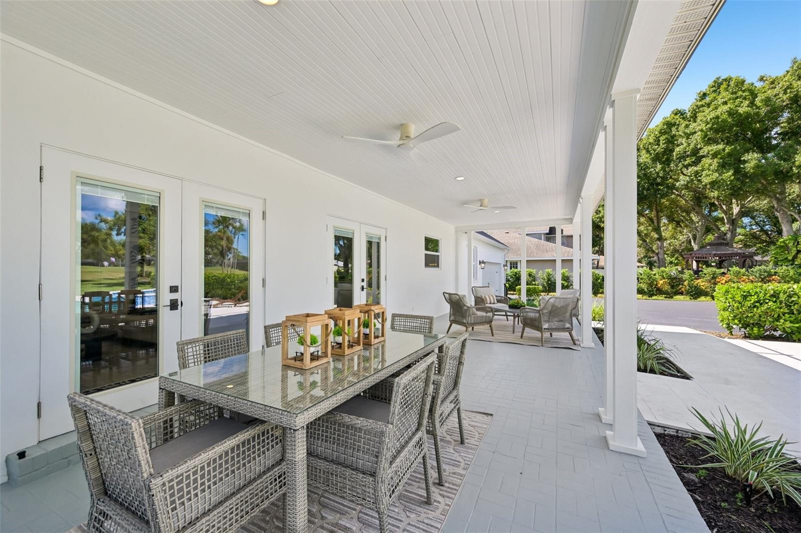 Expansive back porch offers plenty of room to entertain.