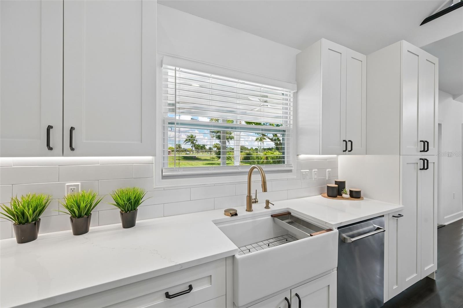 The kitchen is filled with natural light.