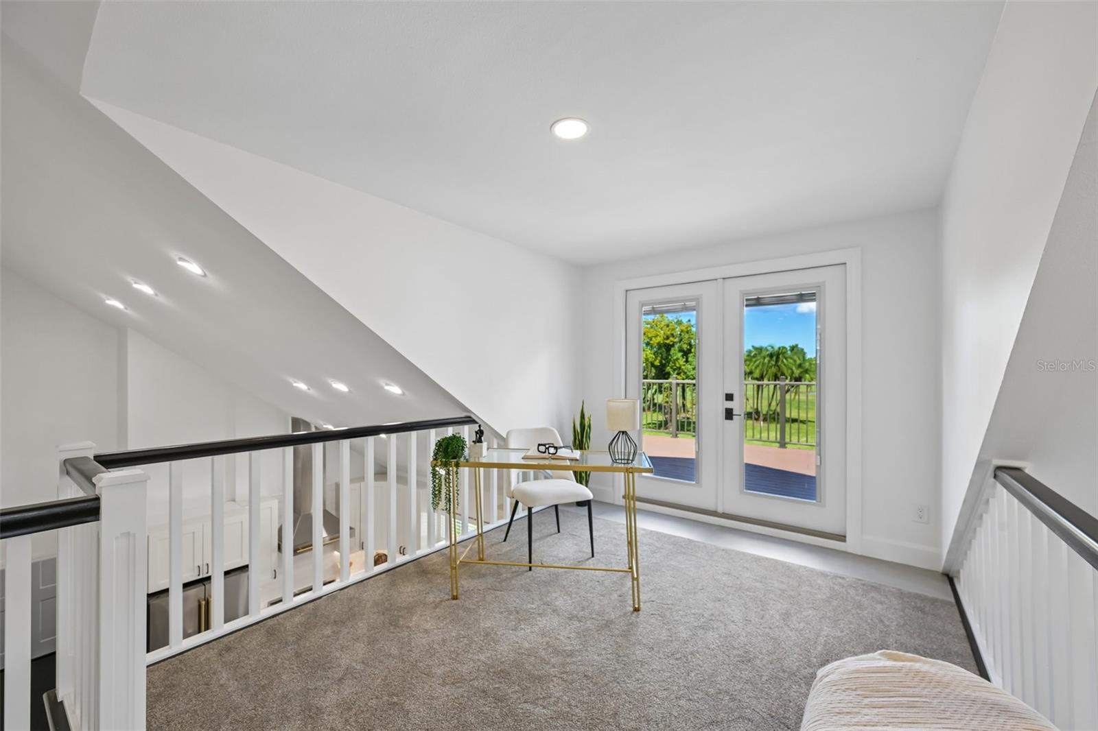 Access to the upstairs deck from the loft.