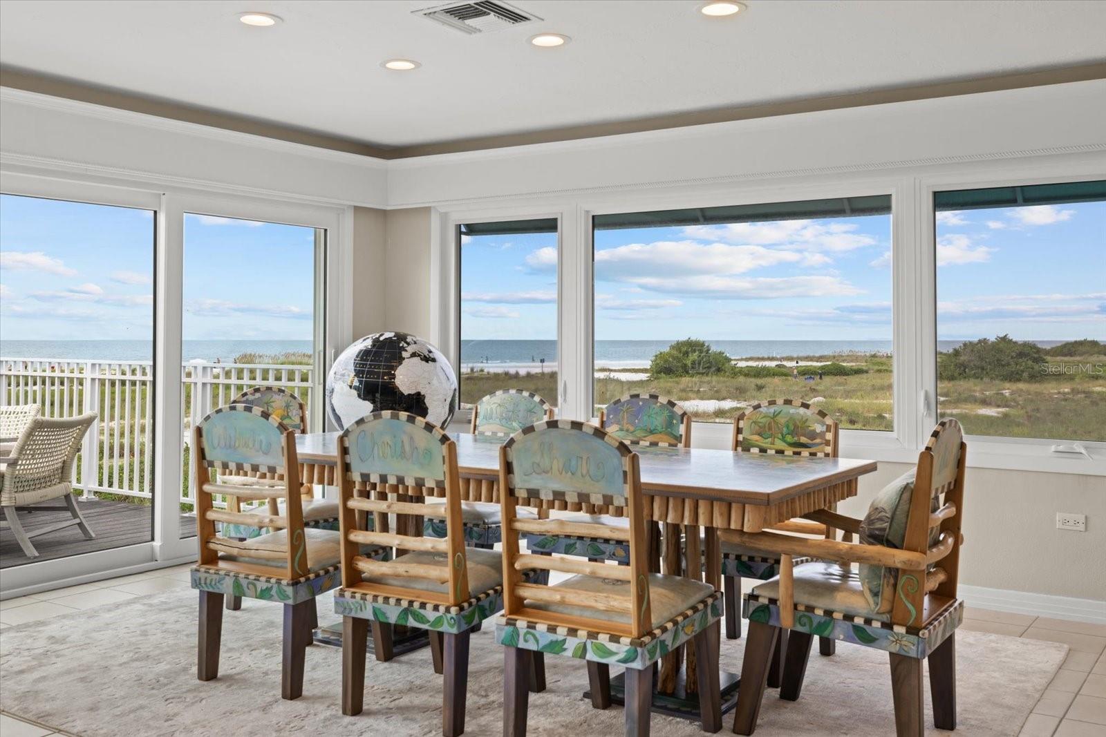 Dining area with stunning beach views Dining area with stunning beach views