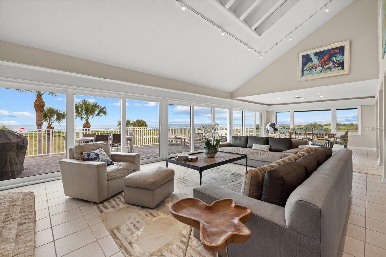 Living room with endless beach views Living room with endless beach views