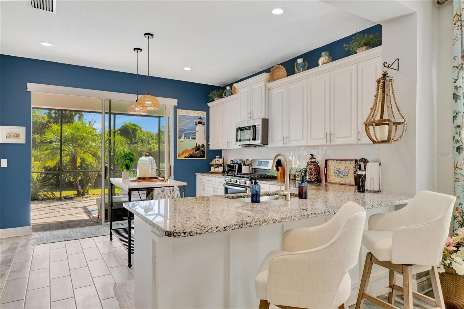 Breakfast bar overlooks backyard landscape