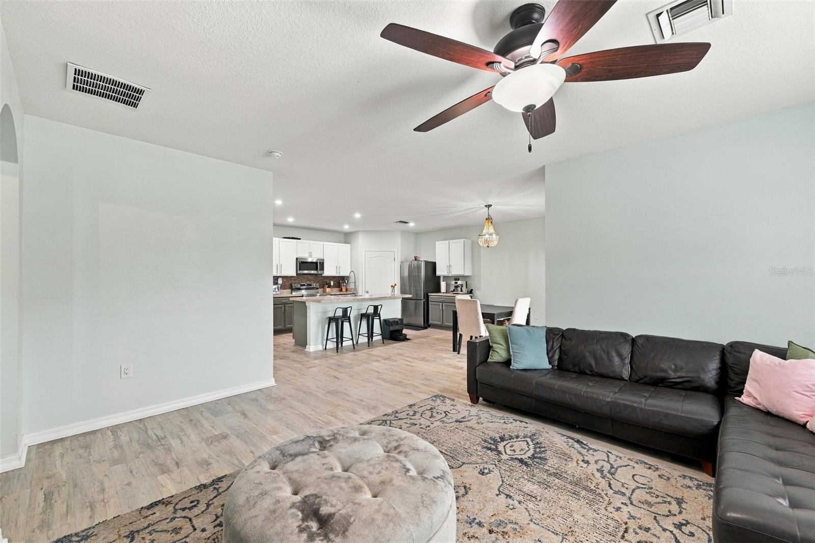 Living room looking into kitchen/dining areas