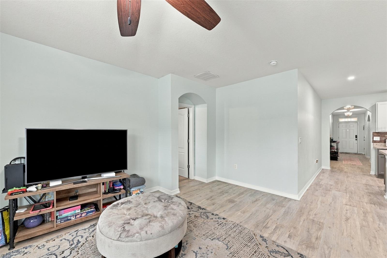 Living room/hallway to 3 guest bedrooms and laundry