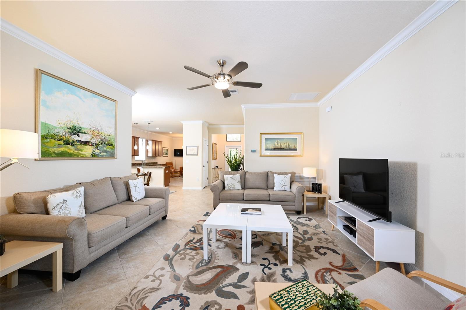 Great Room facing kitchen on left and entry foyer