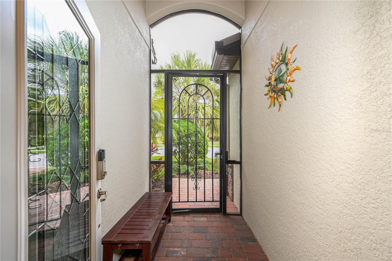 Exterior screened in front entry way, facing out