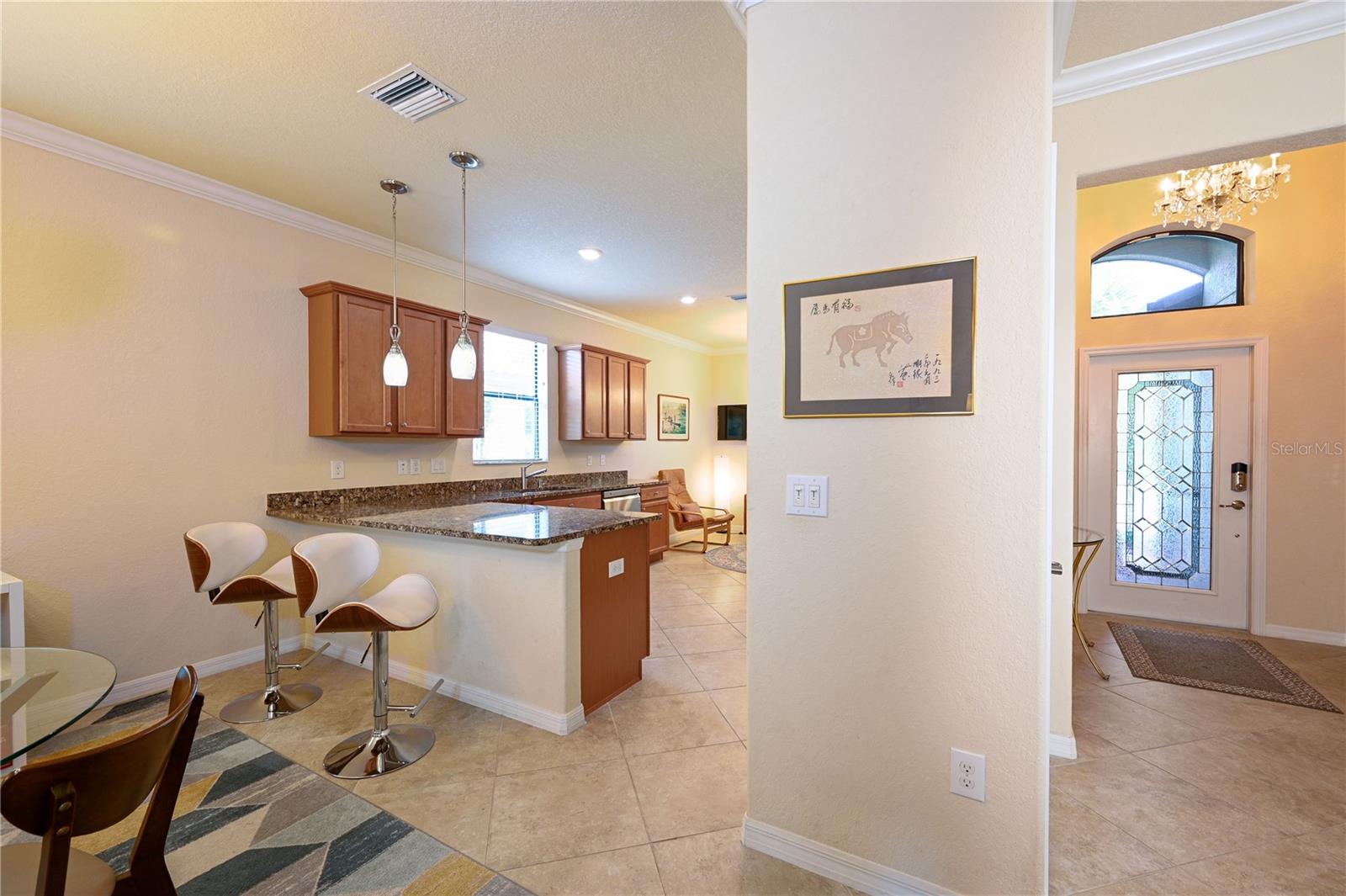 Dining area, breakfast bar and kitchen from Great Room