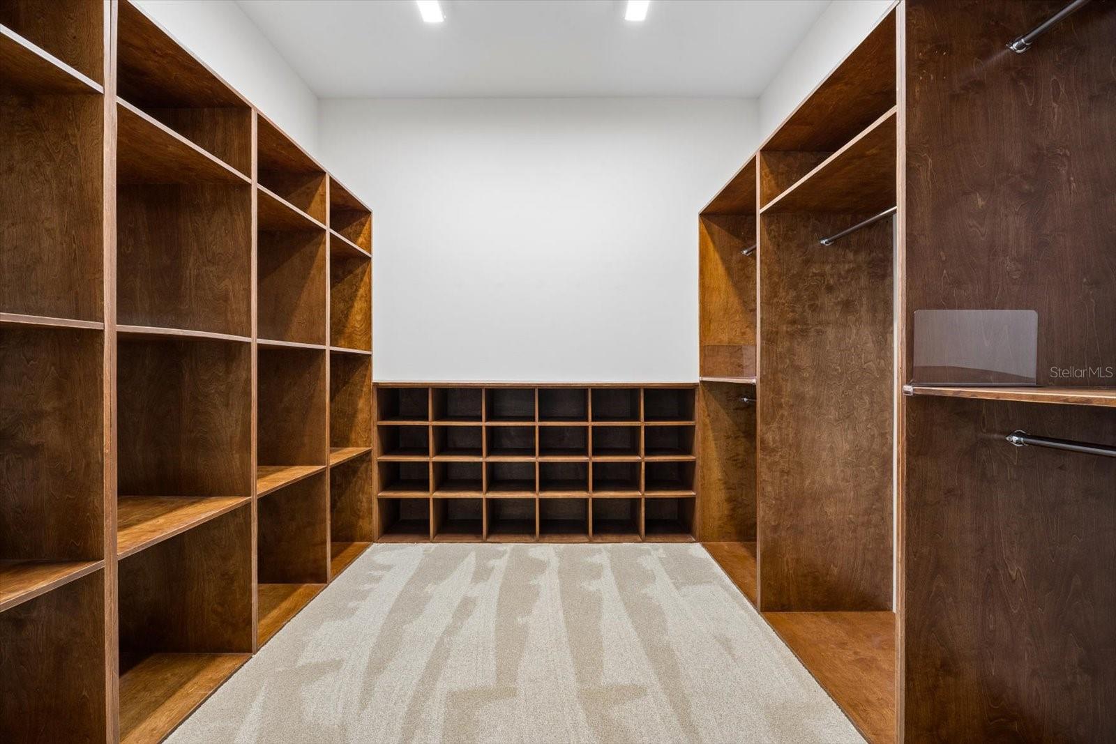Primary custom walk-in closet