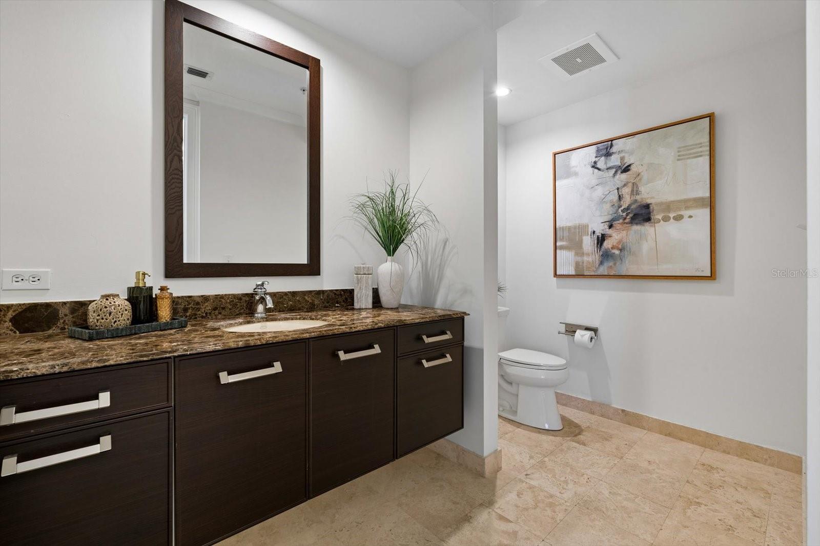 Half bathroom by the front entry Half bathroom by the front entry