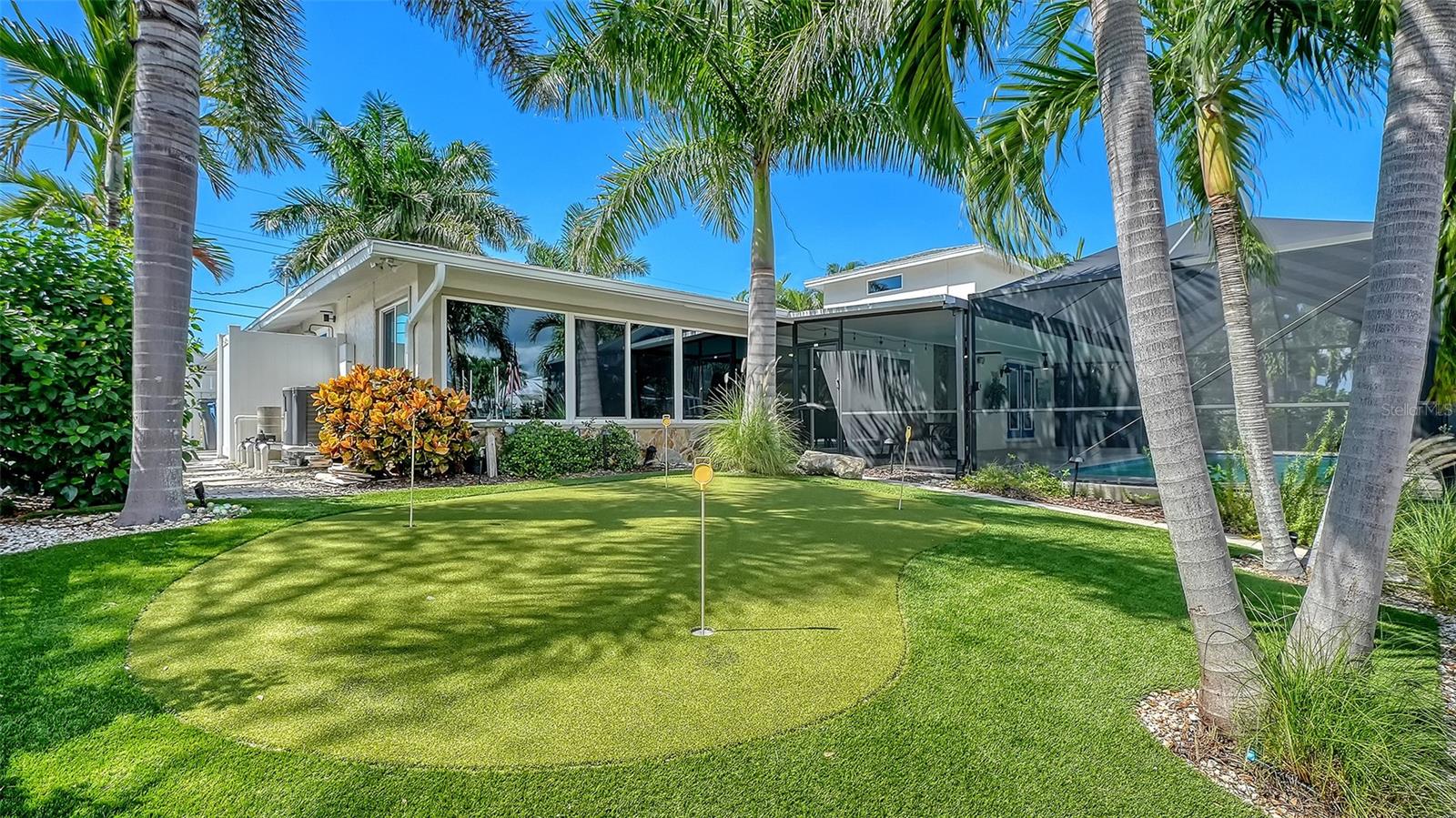 A backyard putting green adds another way to enjoy the outdoors.