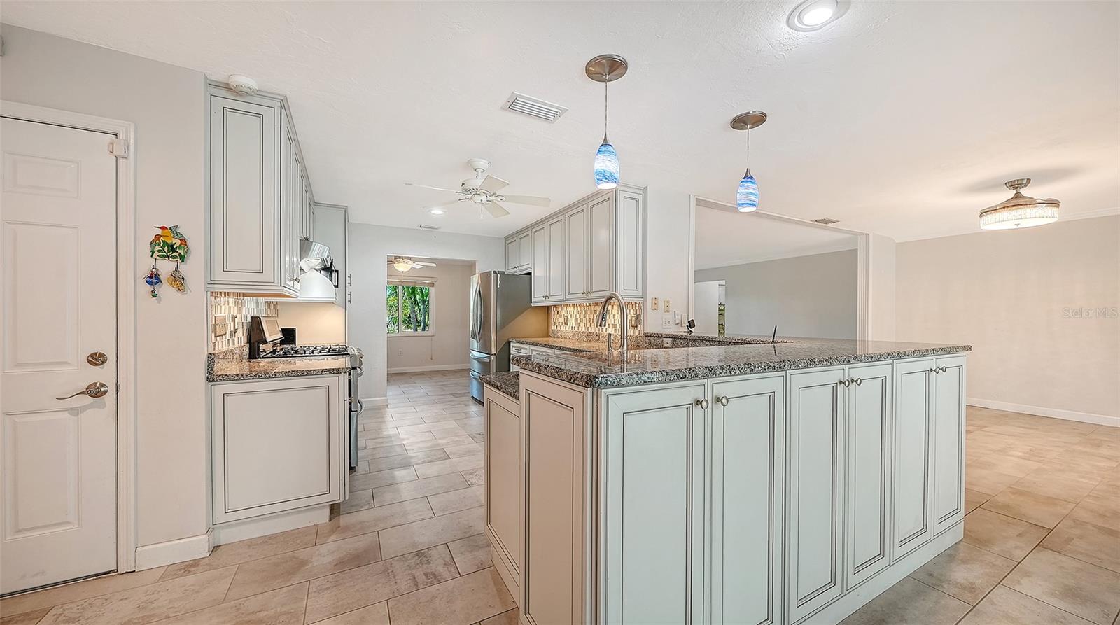 A welcoming kitchen at the center of your gatherings.