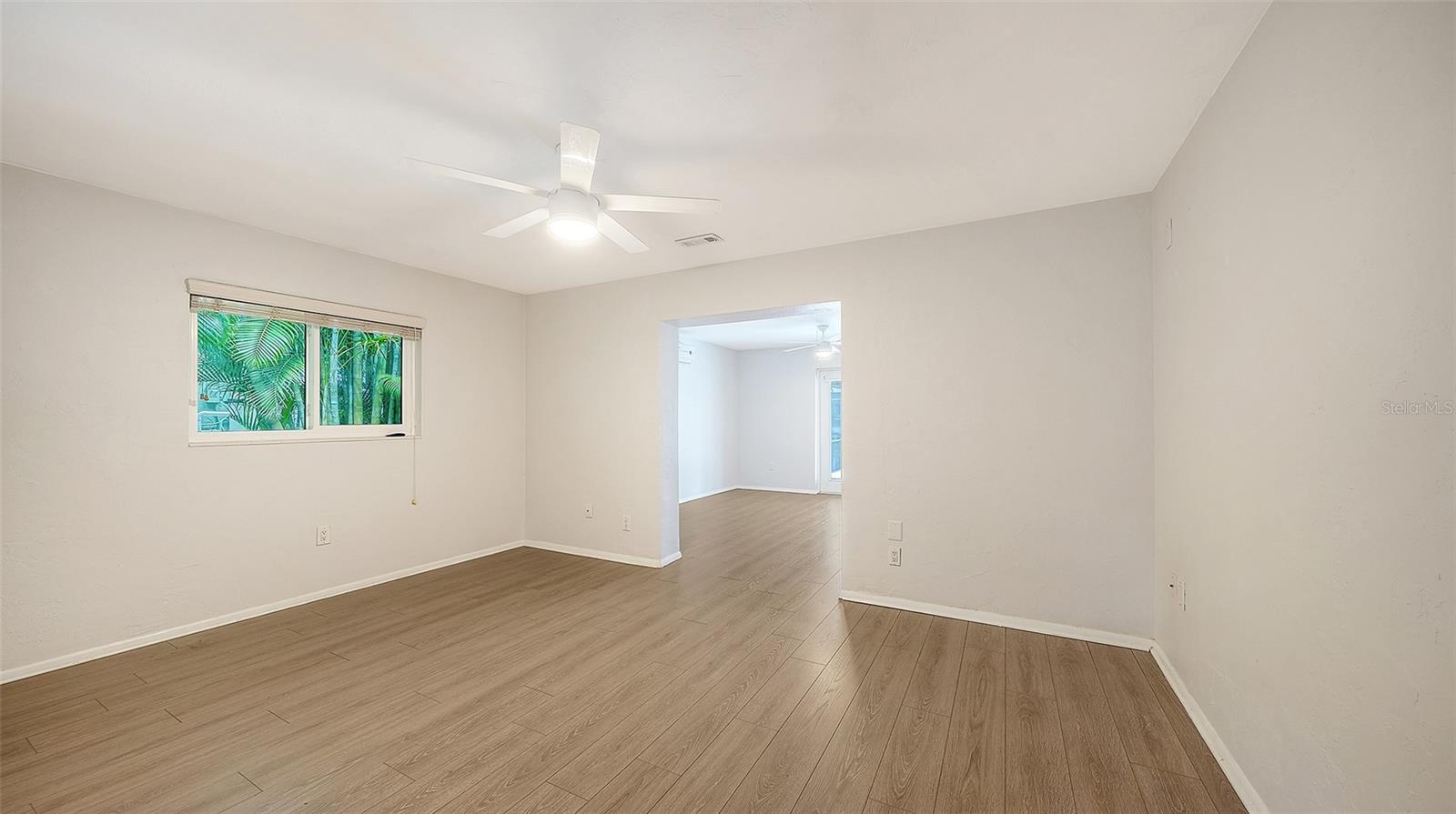 Large Master Bedroom retreat with an adjoining sitting area.