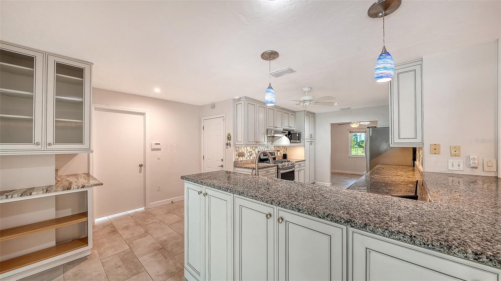 Counter seating space keeps conversation close to the cook.
