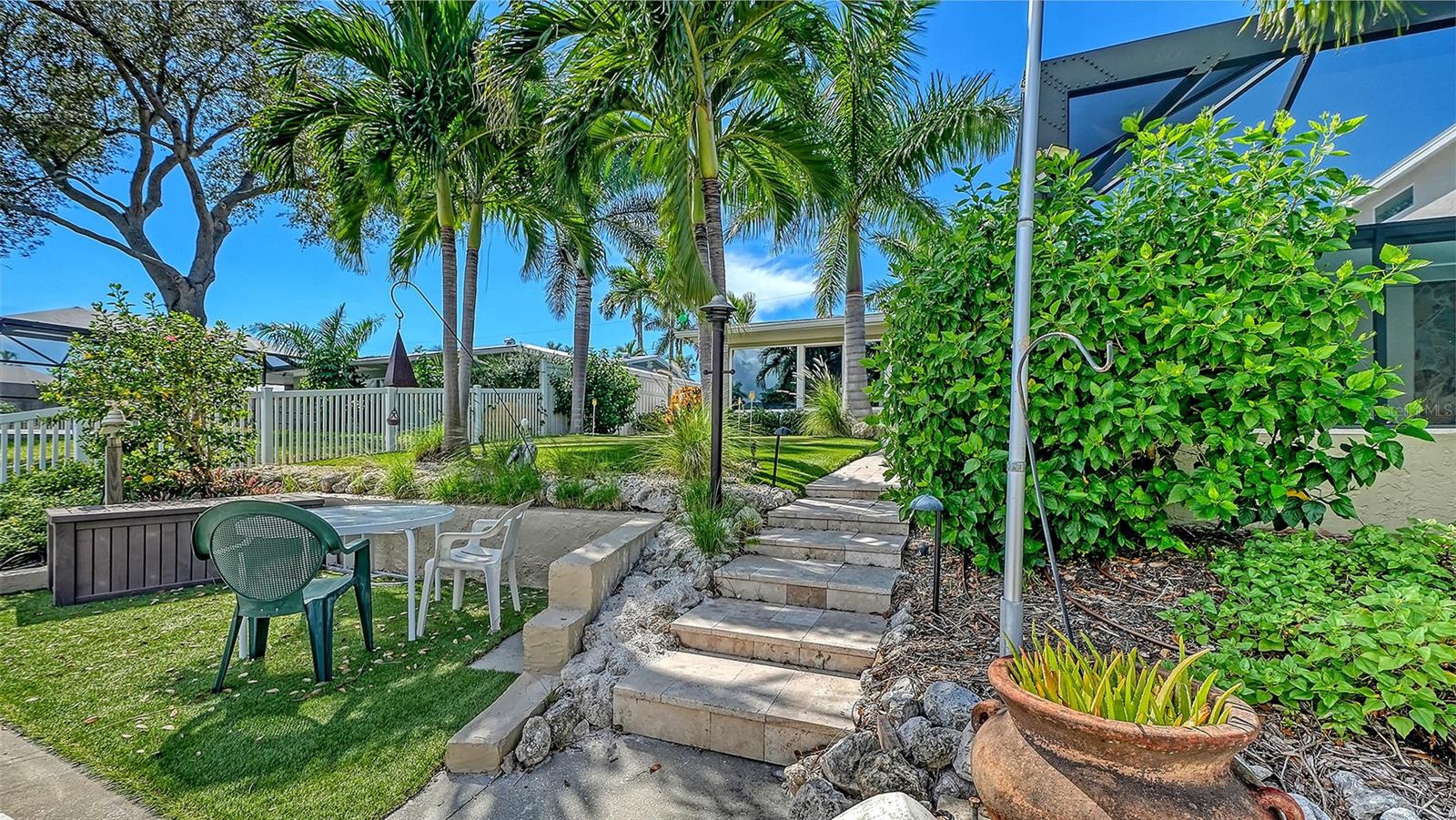 Follow the garden steps from the waterfront to the backyard.