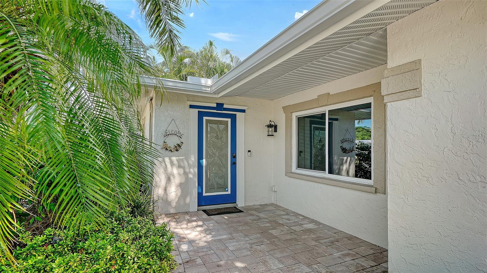 A sheltered entry welcomes you home from a day on the water.