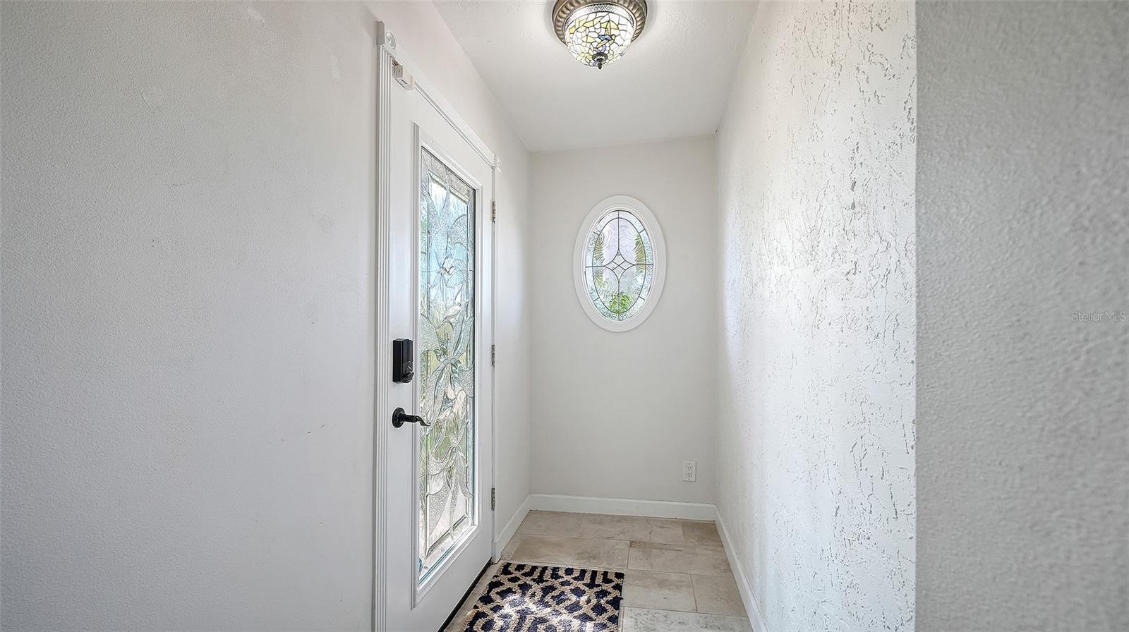 A welcoming entry leads into the heart of the home.