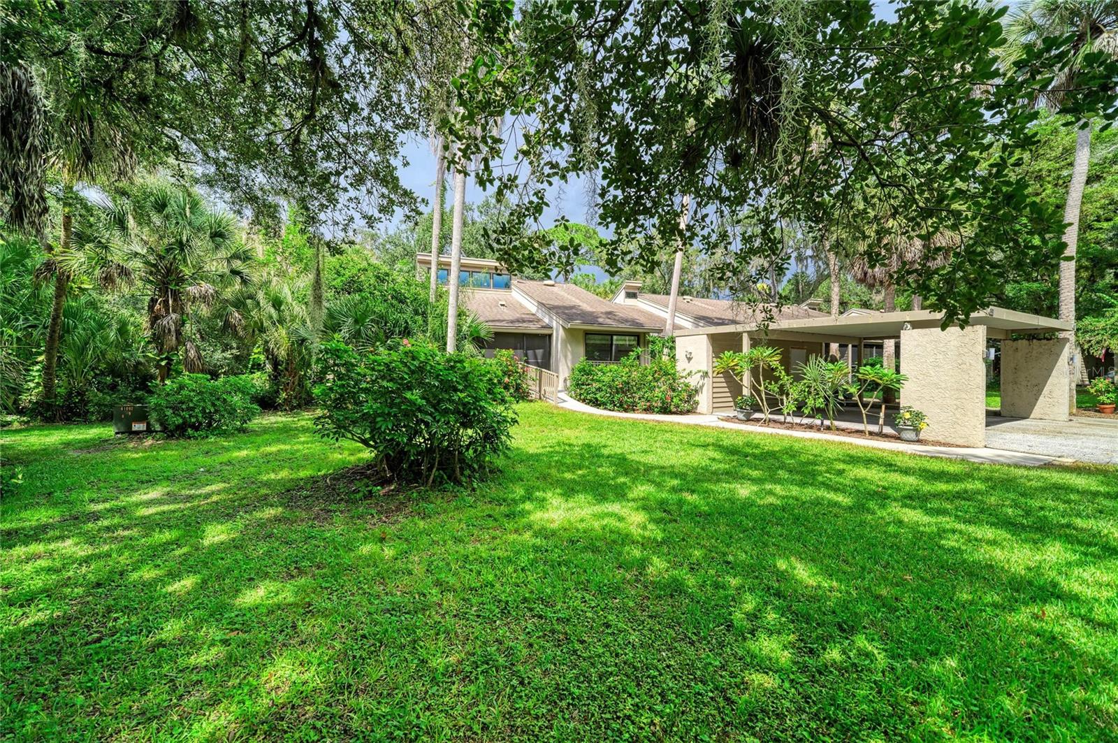 Private end unit surrounded by wooded area!