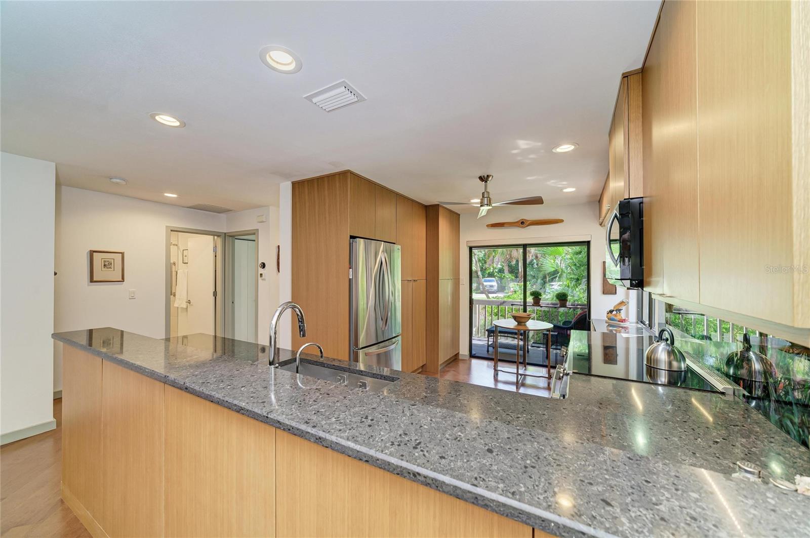 Kitchen with sliders to the front screened porch