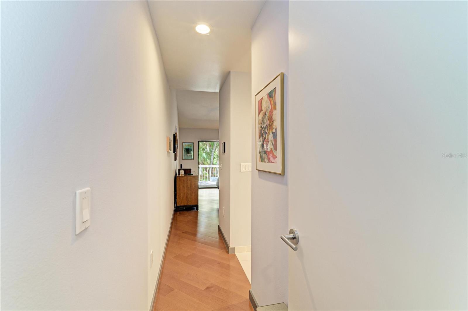 Entering into the primary bedroom/bathroom