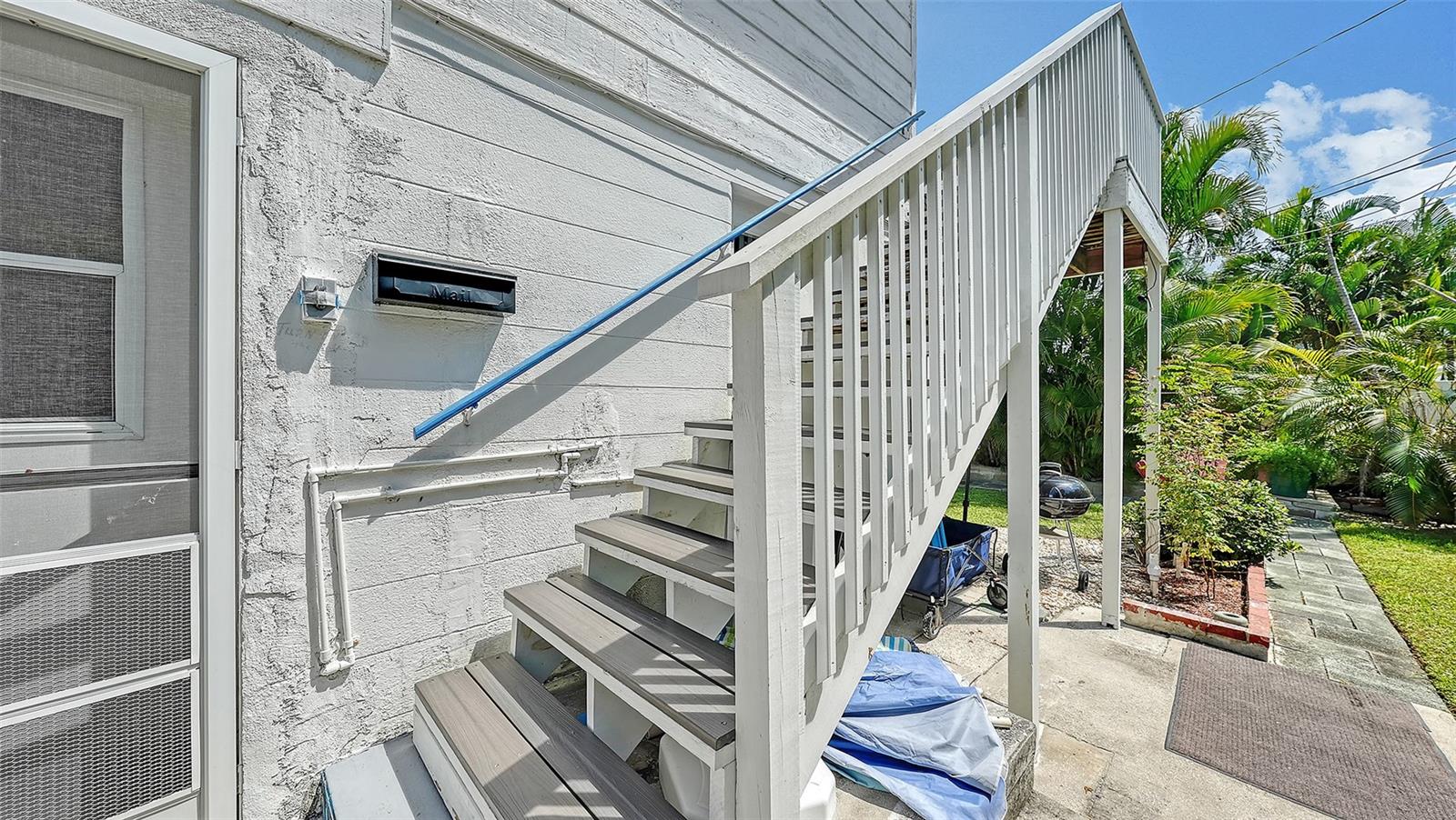 Side entrance up the stairs to Apt B