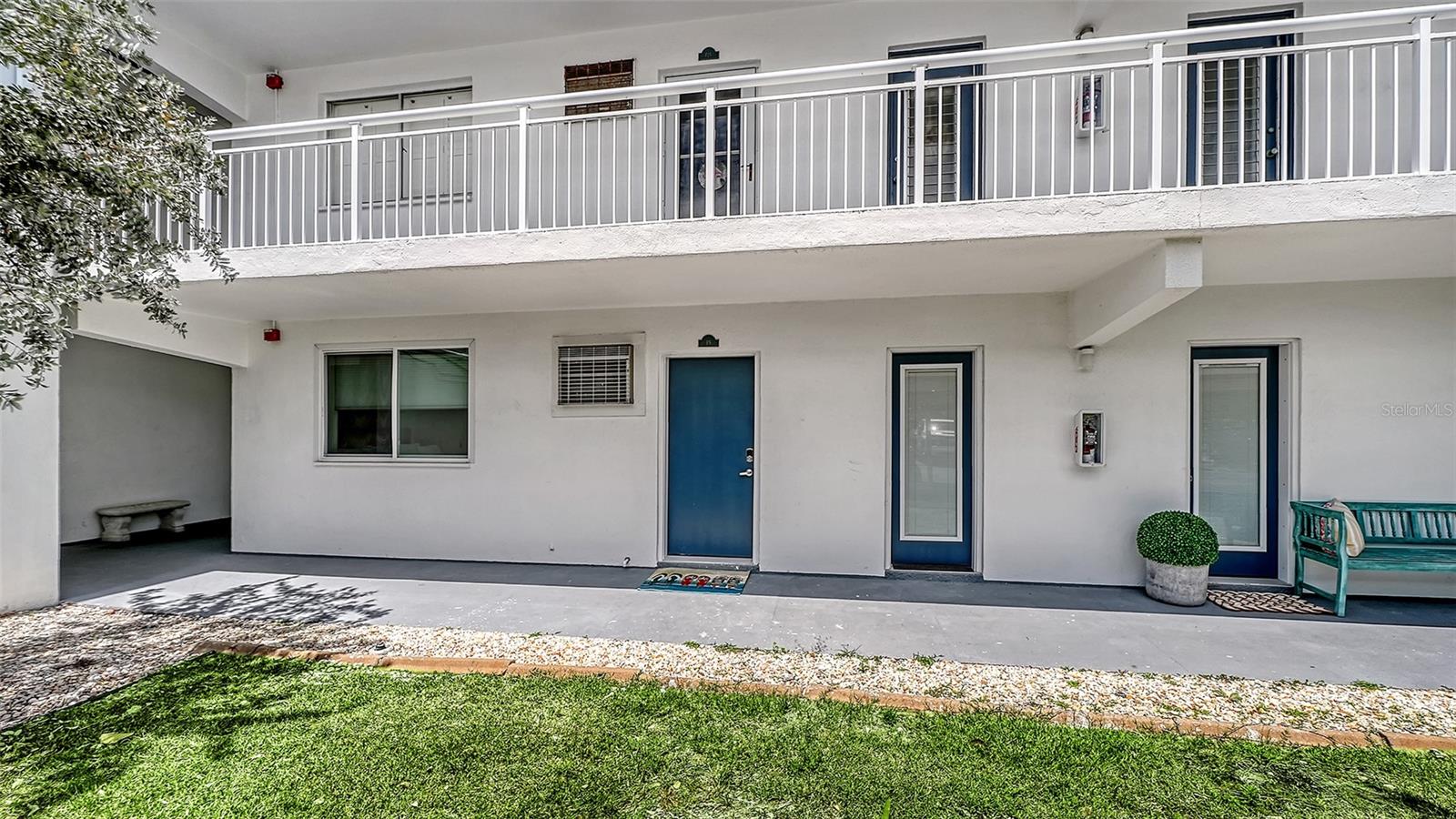 First floor unit with car parking directly in front of condo.