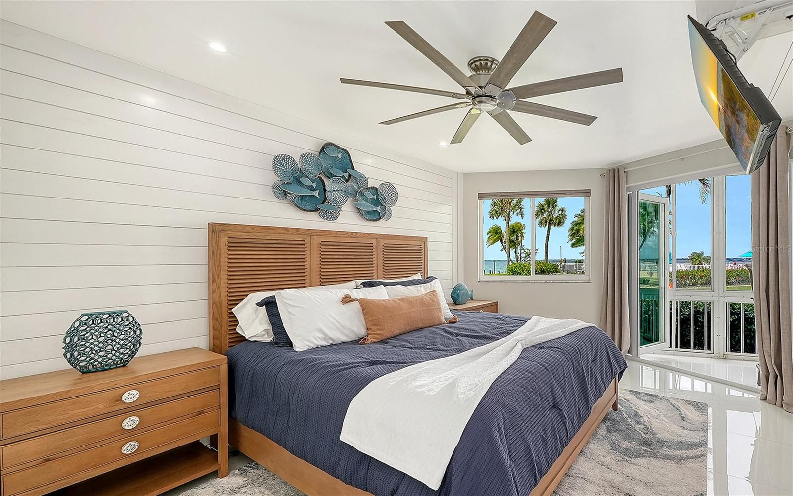 Primary bedroom with custom built in closets.